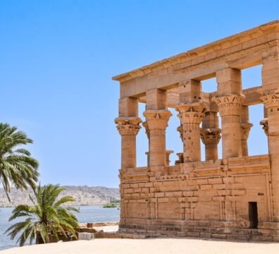 Explore the majestic ruins of an ancient temple by the Nile in Aswan, Egypt.